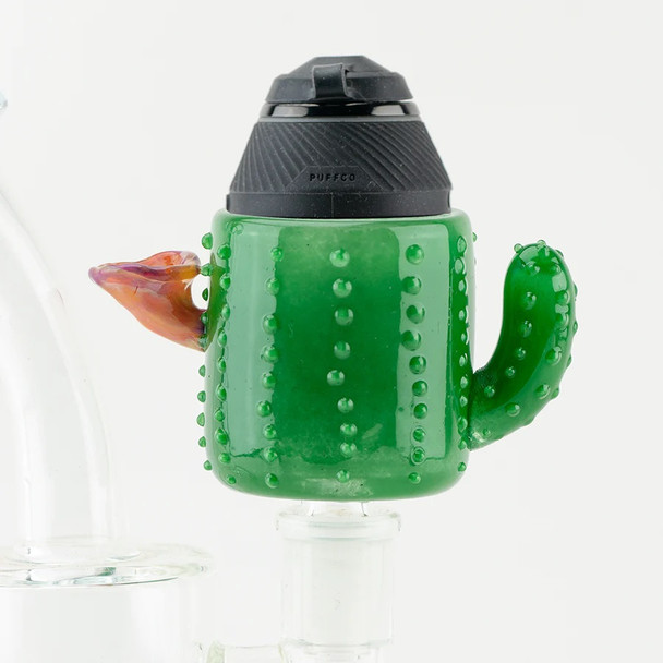 Cactus Proxy cup mounted on device, side profile showing orange flower accent and textured spines; retail smoke gear product demo image. Cactus Proxy cup mounted on device, side profile showing orange flower accent and textured spines; retail smoke gear product demo image.