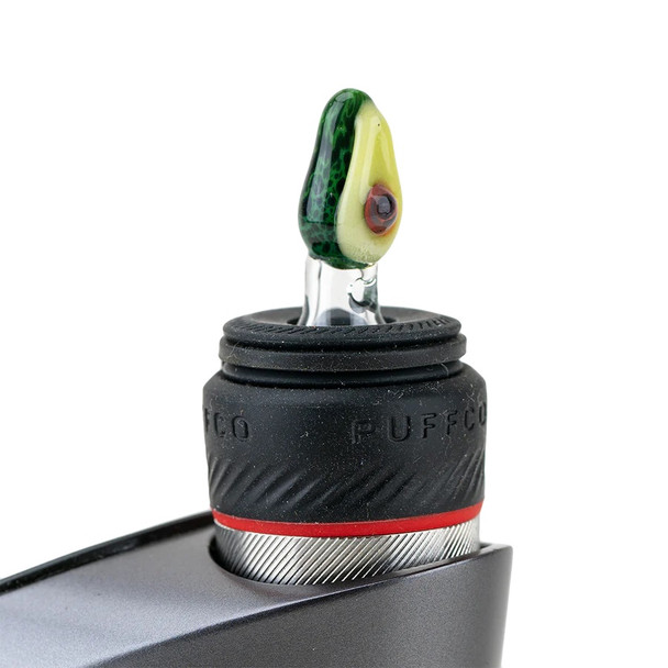 Avocado glass ball cap installed on Puffco Peak Pro; textured green/cream topper shown in-use for head-shop merchandising.