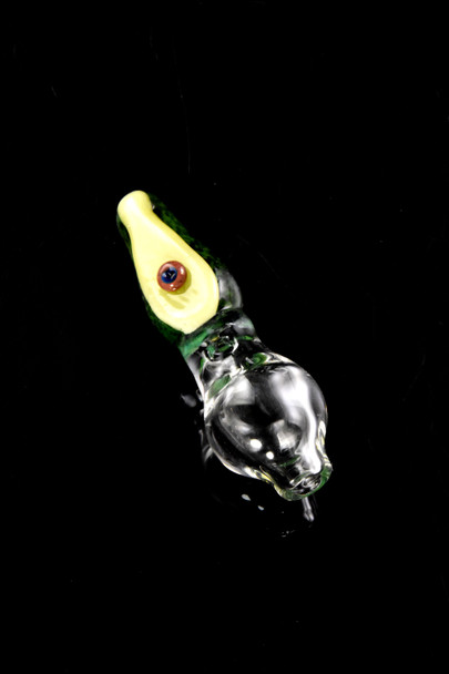 Close-up avocado Puffco Peak Pro glass ball cap on black backdrop for wholesale retail; green and cream top with brown pit detail.