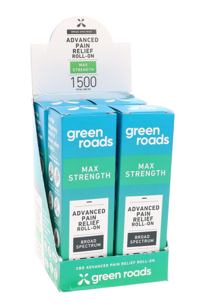 Counter-ready 4-pack display tray of Green Roads 1500 mg Advanced Pain Relief roll-ons; teal/white boxes; wholesale POP unit, angled front view.