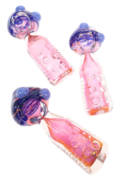 Three pink and purple glass spoon pipes with striped bowls, raised glass accents, and indented cylinder-shaped bodies