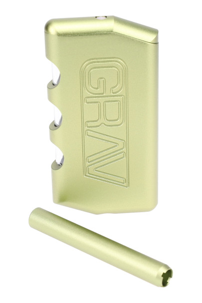 Wholesale GRAV 3.75″ aluminum dugout in light green anodized tone with stash window and taster shown, handheld pocket EDC angle.