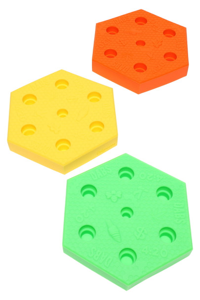 Wholesale honeycomb silicone bowl display in assorted neon orange, yellow and green, 5-inch hex stand showing top-down view of empty slots