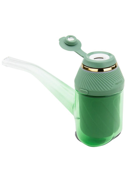 Assembled Flourish Proxy with tethered cap on pipe, three-quarter angle; green glass body and gold trim shown for B2B retail smoke gear pages.