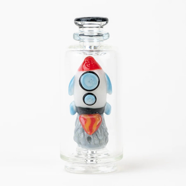 Clear studio front view showing red-blue rocket ship inside glass chamber; worked detail for retail smoke gear listings, 4.5" tall.