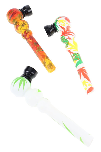 4.5" ceramic hand pipes with metal bowls and leaf decals in white, rasta, and green; top-down studio trio for wholesale listings. 4.5" ceramic hand pipes with metal bowls and leaf decals in white, rasta, and green; top-down studio trio for wholesale listings.
