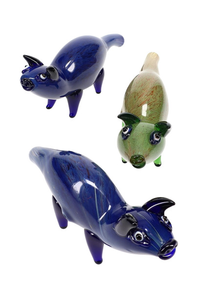 Wholesale silver-fumed color-changing glass pig pipes, 6" assorted blue/green variants with applied ears and legs, trio layout on white.