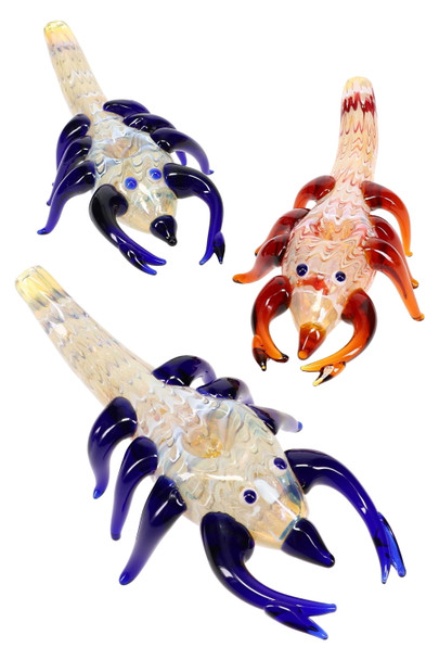 Wholesale 7" color-changing silver-fumed raked glass scorpion pipe, assorted blue/red claw variants, trio layout on white, front three-quarter view.