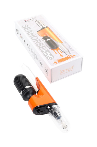 Orange Seahorse King electric dab straw with retail packaging; quartz Type 5 tip capped; wholesale concentrate device, angled view. Orange Seahorse King electric dab straw with retail packaging; quartz Type 5 tip capped; wholesale concentrate device, angled view.