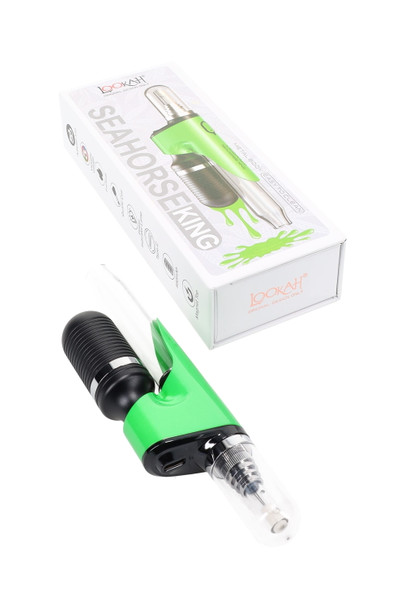 Green Seahorse King electric dab straw with box; glass tube mouthpiece and LED button detail; head-shop supplies front view. Green Seahorse King electric dab straw with box; glass tube mouthpiece and LED button detail; head-shop supplies front view.