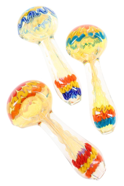 Trio of 4" silver-fumed, color-changing spoon pipes with multicolor squiggle accents and bubbled bowls, angled studio view for wholesale head-shop buyers. Trio of 4" silver-fumed, color-changing spoon pipes with multicolor squiggle accents and bubbled bowls, angled studio view for wholesale head-shop buyers.