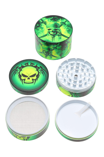 2.5" skull glow metal grinder disassembled on white, four pieces with mesh screen and scraper; bright green design for wholesale catalog.
