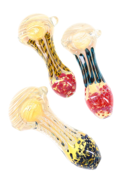 Trio of 4" silver-fumed color-changing striped spoon pipes with frit mouthpieces and marble grips, assorted hues, angled studio view for wholesale buyers.