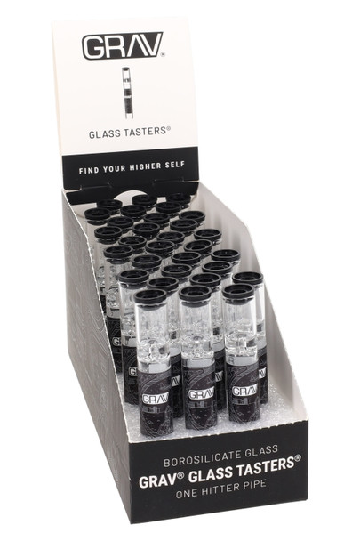 Counter display of 30 GRAV 12 mm glass tasters with black silicone tips; retail-ready wholesale tray for quick register upsells. Counter display of 30 GRAV 12 mm glass tasters with black silicone tips; retail-ready wholesale tray for quick register upsells.