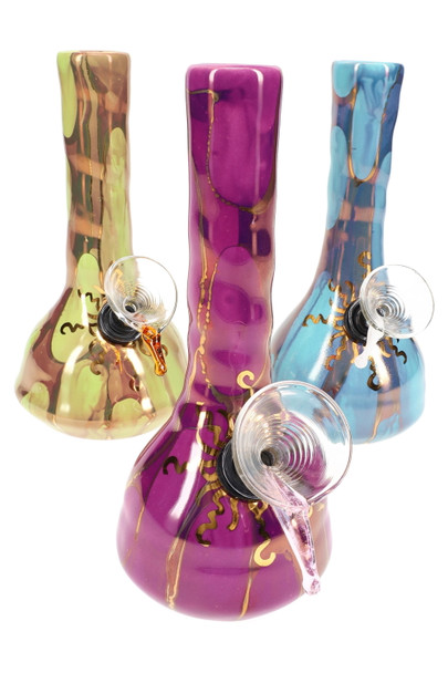 Bulk 6-inch US-made ceramic small beaker water pipes in purple, aqua & camo glazes with glass slide bowls and gold sun motif, group shot