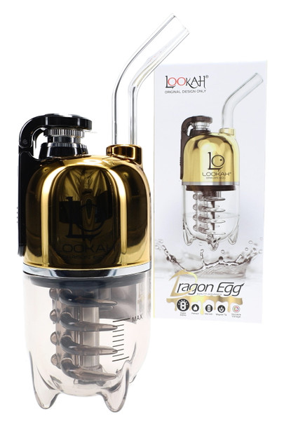 Gold-finish Dragon Egg e-rig with reflective body and clear chamber; packaged for shelves, premium head-shop wholesale image.