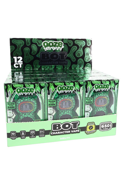 12-count Melty Ooze Bot character battery display tray with boxed units and header card, front three-quarter angle for retail wholesale catalogs. 12-count Melty Ooze Bot character battery display tray with boxed units and header card, front three-quarter angle for retail wholesale catalogs.