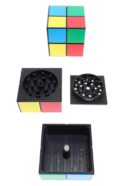 1.5-inch 3-part plastic cube grinder disassembled, black interior with magnetic post; assorted color blocks for wholesale head-shop displays. 1.5-inch 3-part plastic cube grinder disassembled, black interior with magnetic post; assorted color blocks for wholesale head-shop displays.