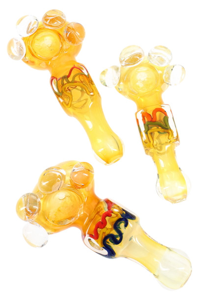 5" color-changing glass spoon with squiggle cube detail and clear marble grips, warm yellow tones, top view—ideal for head-shop wholesale listings 5" color-changing glass spoon with squiggle cube detail and clear marble grips, warm yellow tones, top view—ideal for head-shop wholesale listings