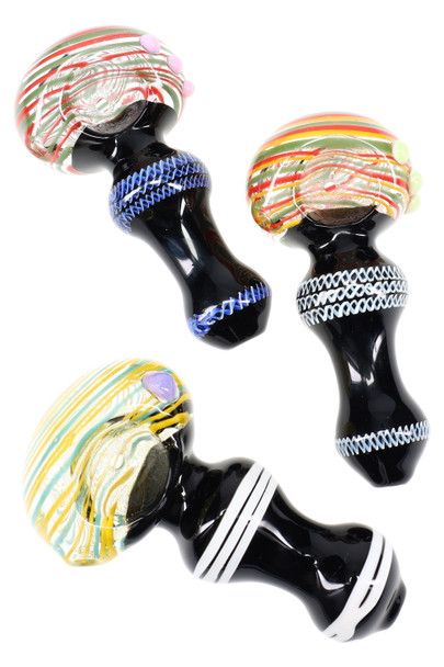 Trio of 4.5" clear striped glass spoon pipes with black stems, marble grips, assorted red/green and yellow/blue bowls, top-down studio view for wholesale listings Trio of 4.5" clear striped glass spoon pipes with black stems, marble grips, assorted red/green and yellow/blue bowls, top-down studio view for wholesale listings