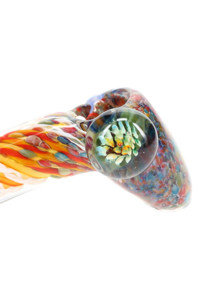 Close-up of floral marble on silver-fumed 4.5" frit glass hammer pipe with yellow-red spiral; retail smoke gear detail shot, side angle. Close-up of floral marble on silver-fumed 4.5" frit glass hammer pipe with yellow-red spiral; retail smoke gear detail shot, side angle.
