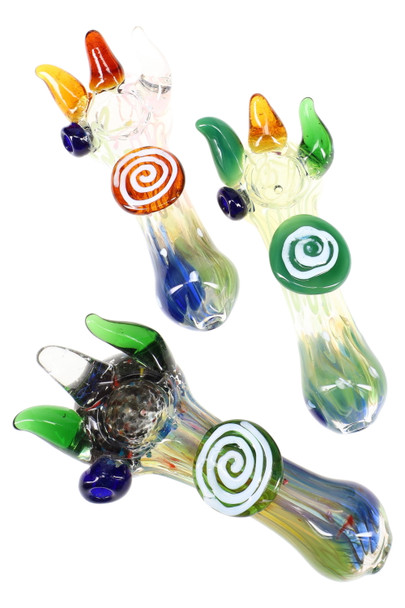 Three 5" silver-fumed color-changing glass spoons with spike accents and swirl marbles; assorted colors, wholesale head-shop angle, bright white backdrop. Three 5" silver-fumed color-changing glass spoons with spike accents and swirl marbles; assorted colors, wholesale head-shop angle, bright white backdrop.