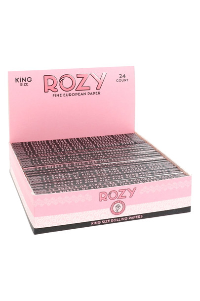 Rozy pink king size rolling papers wholesale display; 24 booklets arranged in tray, “Fine European Paper,” front-left merchandising angle Rozy pink king size rolling papers wholesale display; 24 booklets arranged in tray, “Fine European Paper,” front-left merchandising angle