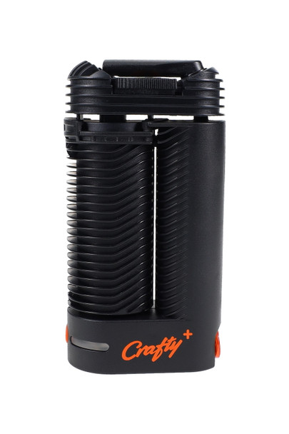Retail smoke-shop Crafty+ dry herb vaporizer in black with cooling fins and orange logo, straight front view highlighting compact handheld design.