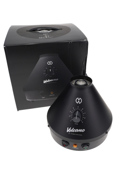 Wholesale Volcano Classic Onyx Black desktop vaporizer with retail box, analog temp dial and Heat/Air switches, front three-quarter studio angle.