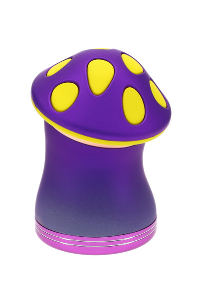 Purple and yellow mushroom grinder, 2.25″ 4-part zinc-alloy body with metallic finish, head-shop supplies product shot, upright studio angle.