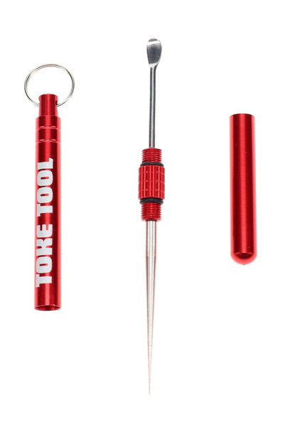 Retail smoke gear Stoned Earth Toke Tool disassembled, 3.5″ metal keychain showing dab spoon, bowl pick and cap, centered front studio view. Retail smoke gear Stoned Earth Toke Tool disassembled, 3.5″ metal keychain showing dab spoon, bowl pick and cap, centered front studio view.