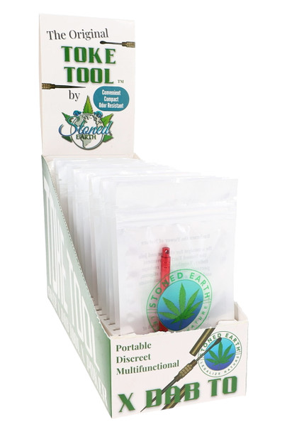 Wholesale counter display of 24 Stoned Earth Toke Tools in retail pouches, branded tray highlights compact, odor-resistant keychain multi-tool.