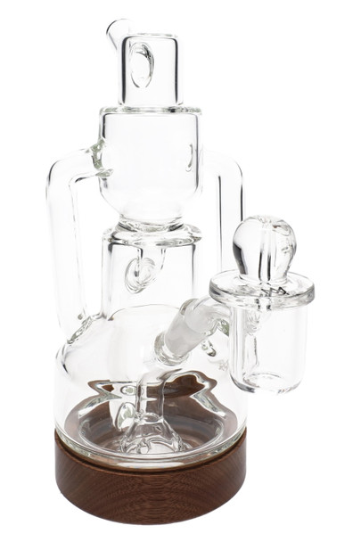 Clear borosilicate mini recycler dab rig with milled black walnut base, 7.4 inches; wholesale head-shop rig shown front angle with 10 mm banger. Clear borosilicate mini recycler dab rig with milled black walnut base, 7.4 inches; wholesale head-shop rig shown front angle with 10 mm banger.