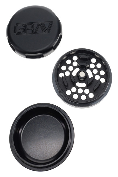 Black GRAV 2.75" 3-part aluminum grinder disassembled—magnetic lid, grind plate, and catch chamber—top-down layout for smoke-shop wholesale pages. Black GRAV 2.75" 3-part aluminum grinder disassembled—magnetic lid, grind plate, and catch chamber—top-down layout for smoke-shop wholesale pages.