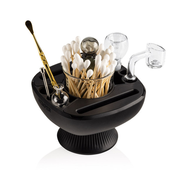 Black Hemper Isoplex station loaded with cotton swabs, banger, carb caps and dab tools, demonstrating organized dab setup for smoke shop marketing.