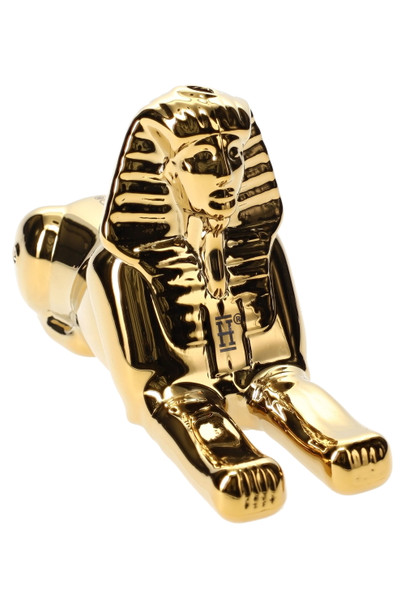 5" gold electroplated Hemper sphinx glass hand pipe in reclining pose, three-quarter view on white for smoke shop wholesale catalogs.