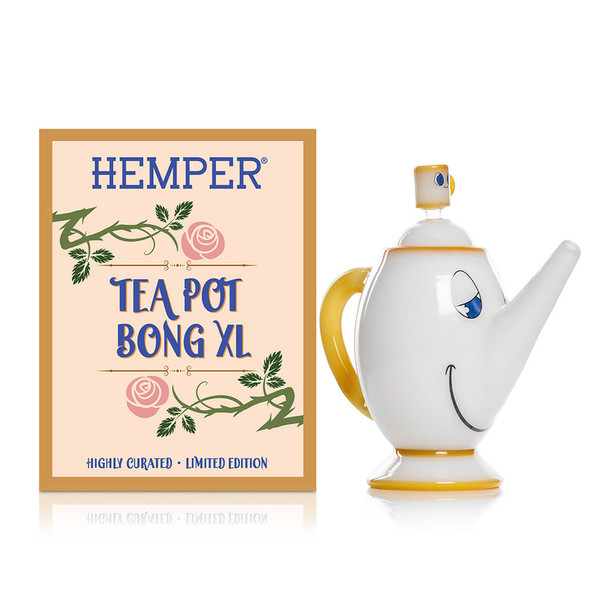 Side-by-side shot of white-and-gold Hemper Tea Pot XL bong and matching floral box, clean hero image for online retail smoke gear catalogs.