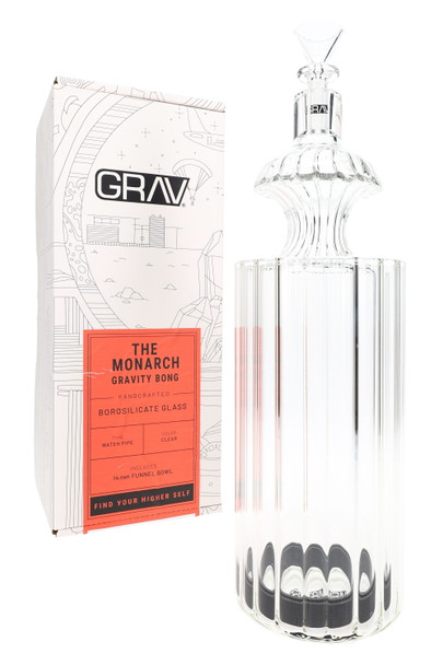 Clear 11" GRAV Monarch gravity water pipe with scalloped sides standing beside branded retail box for smoke shop wholesale displays.