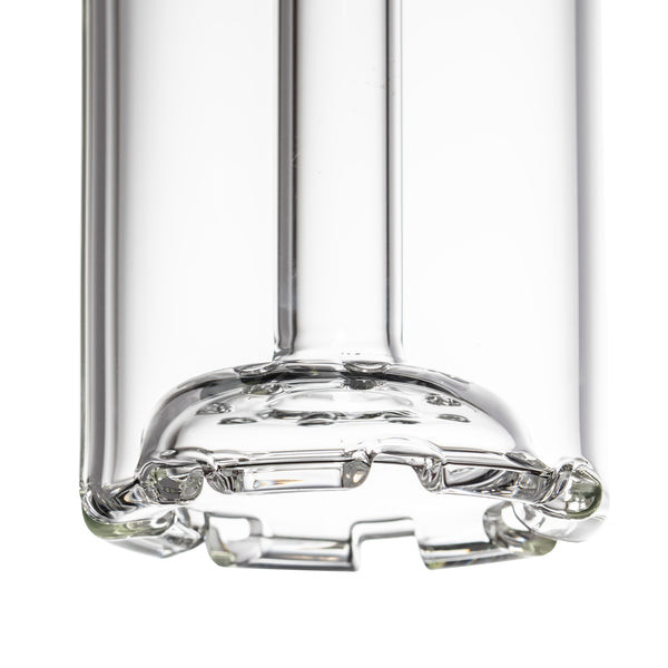 Underside close-up of thick clear glass base on Piston Gravity Bong, showing reinforced foot for shop showcases.