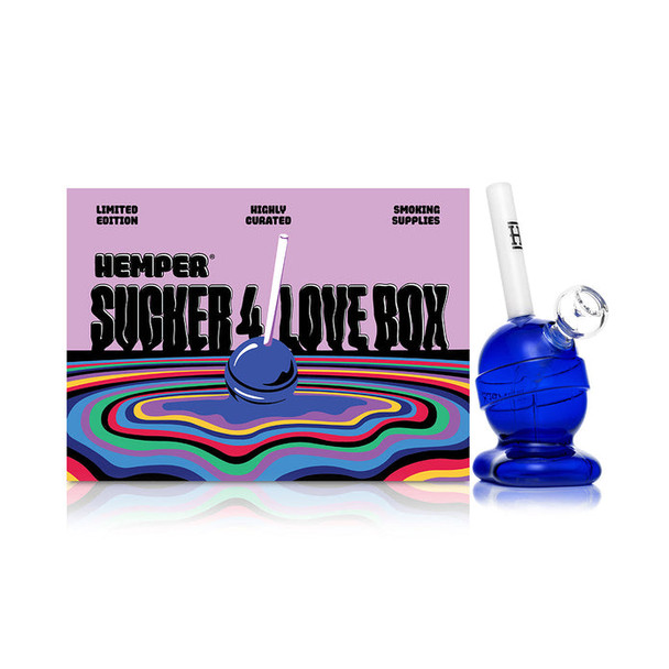 Retail-ready Hemper Sucker 4 Love box beside blue lollipop bong—head shop supplies merchandising photo
