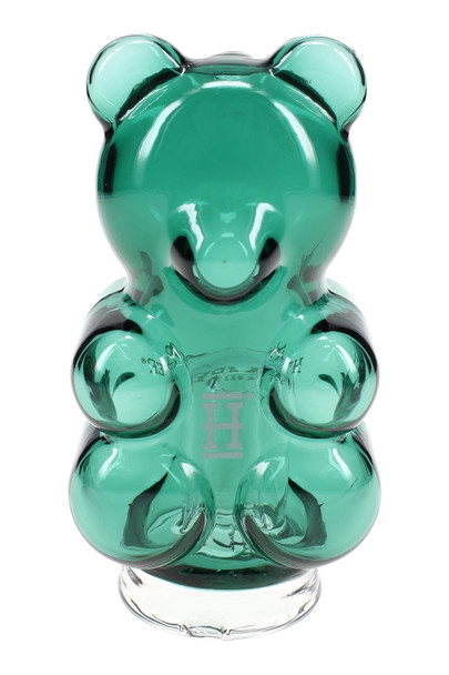 Front view translucent green gummy bear glass Peak top on clear base—retail accessory for device wall
