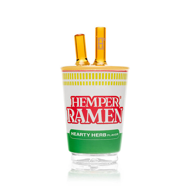 Ramen-cup Peak attachment centered with amber dual straws and green label band—retail smoke gear photo