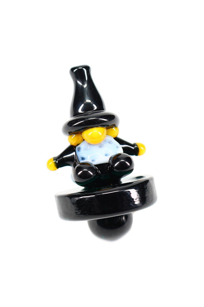 Black glass wizard carb cap with yellow hands and blue robe, front angle—wholesale dab accessory for shops