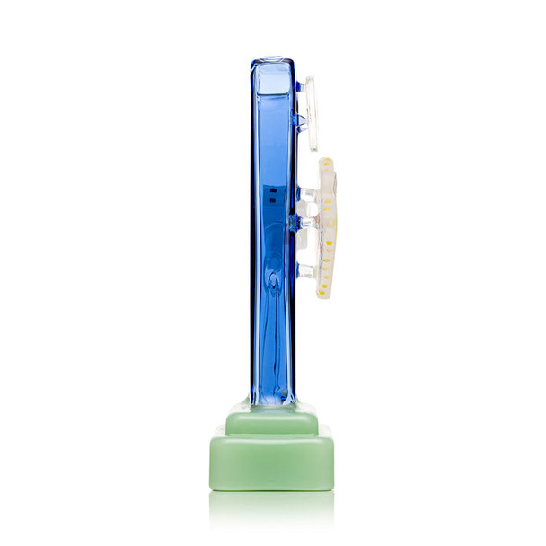 Side profile Las Vegas sign glass bong showing thickness and raised sign plaque, blue frame—wholesale bong side view