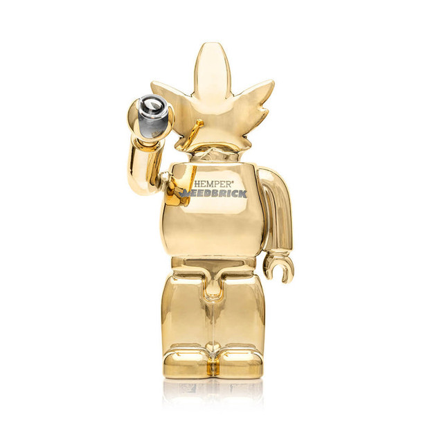 Studio front shot of mirror-gold Weedbrick XL bong with clear bowl, premium retail smoke gear for resale