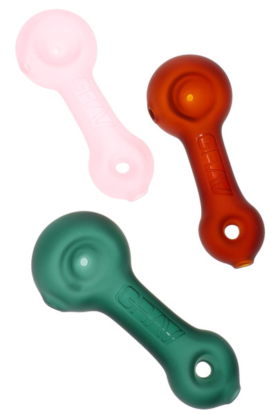 Sandblasted GRAV mini spoon hand pipes for smoke shop resale in pink, amber, and teal matte glass, angled product view