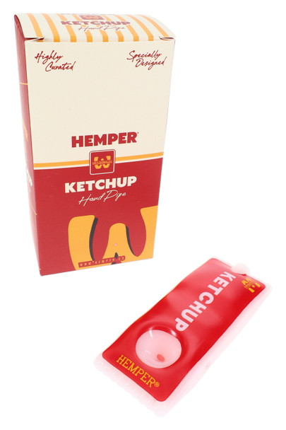 Retail smoke gear photo of red 4-inch ketchup packet glass hand pipe with branded Hemper box, angled front view