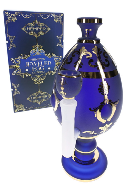 Wholesale glass bong with oversized jeweled egg body, blue finish, clear bowl, and HEMPER retail box in front view