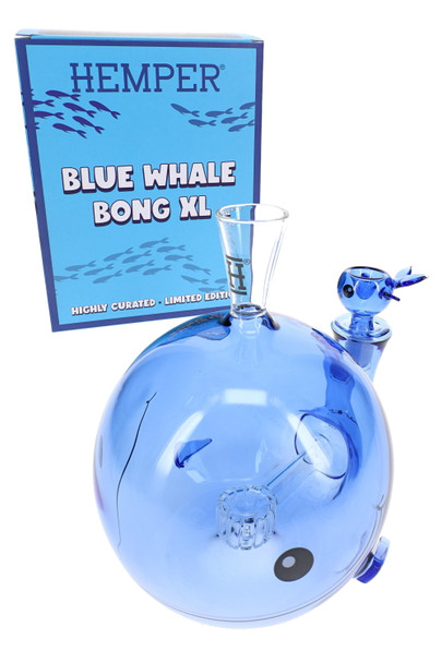 Wholesale glass bong shaped like a blue whale with clear spout mouthpiece and HEMPER retail box, angled view