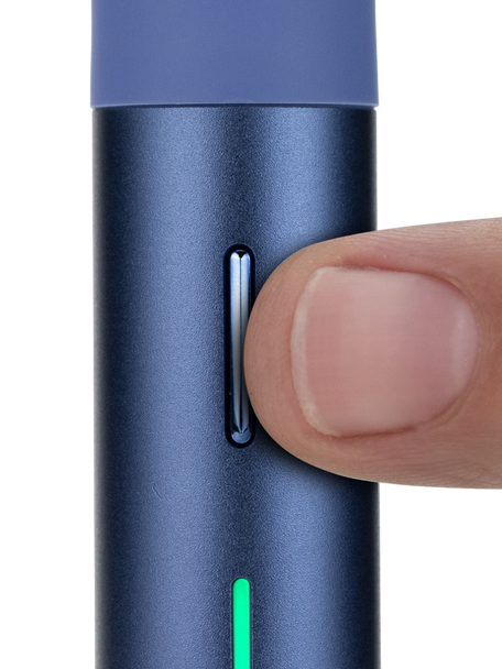 Retail smoke gear Puffco Pivot Sapphire dab pen close-up with finger pressing the slim control button